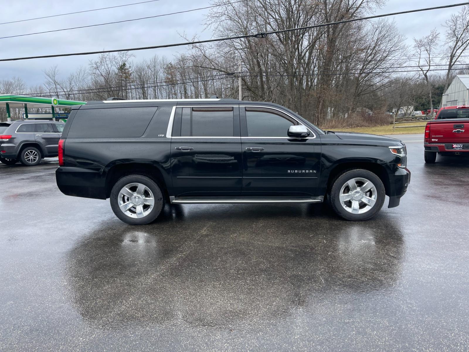 2016 Black /Brown Chevrolet Suburban LTZ 4WD (1GNSKJKC3GR) with an 5.3L V8 OHV 16V engine, 6A transmission, located at 11115 Chardon Rd. , Chardon, OH, 44024, (440) 214-9705, 41.580246, -81.241943 - This 2016 Chevrolet Suburban LTZ 4WD comes equipped with a 5.3 Vortec V8 engine and a 6-speed automatic transmission, offering a robust 8,000-pound towing capacity. It's designed with luxury and convenience in mind, featuring heated and cooled front seats, heated second-row seats, and a range of saf - Photo #6